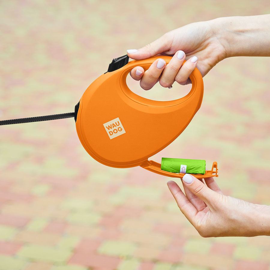 Повідець-рулетка для собак WAUDOG R-leash з контейнером для пакетів, світловідбивна стрічка, L, до 40 кг, 5 м, помаранчевий — фото 4
